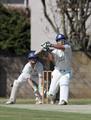 Simon Smith deals with a full toss.jpg